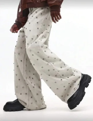 Photo 3 of Quần jeans đính kim loại nam