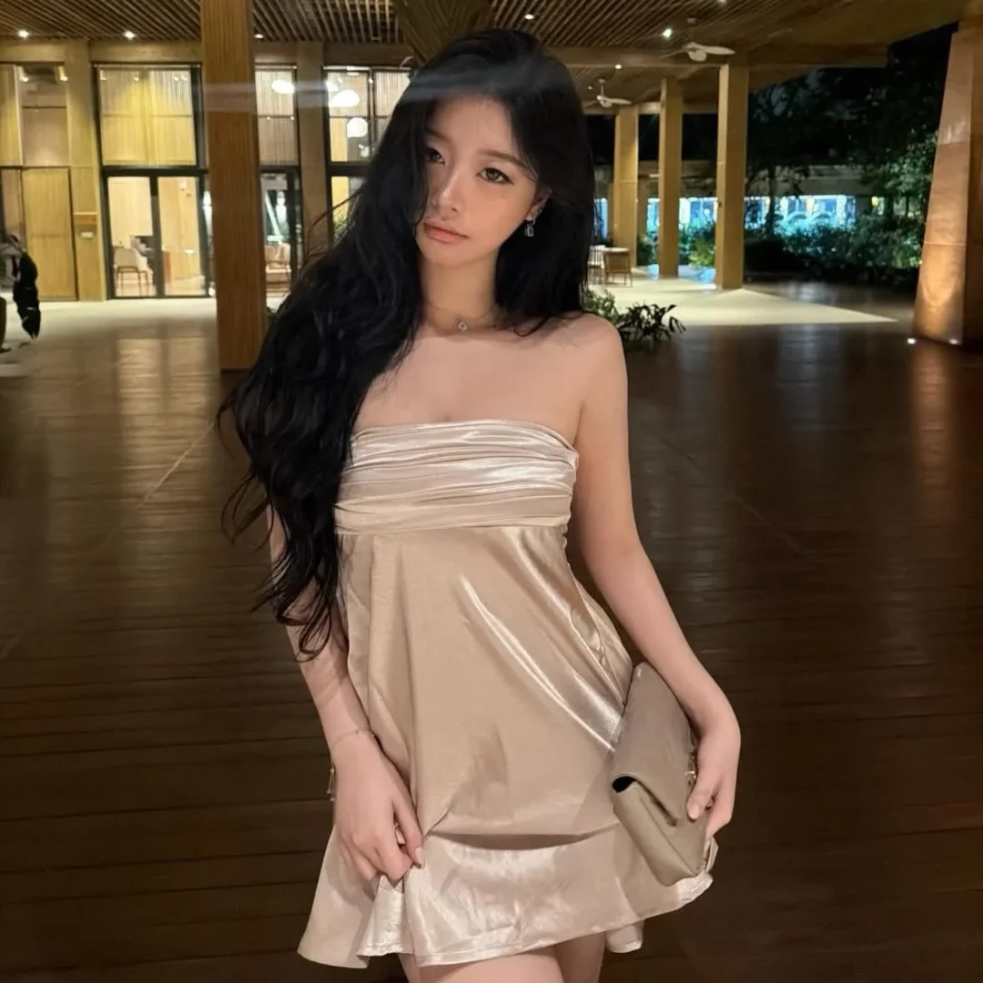 Photo 1 of Váy lụa quây cột nơ sau