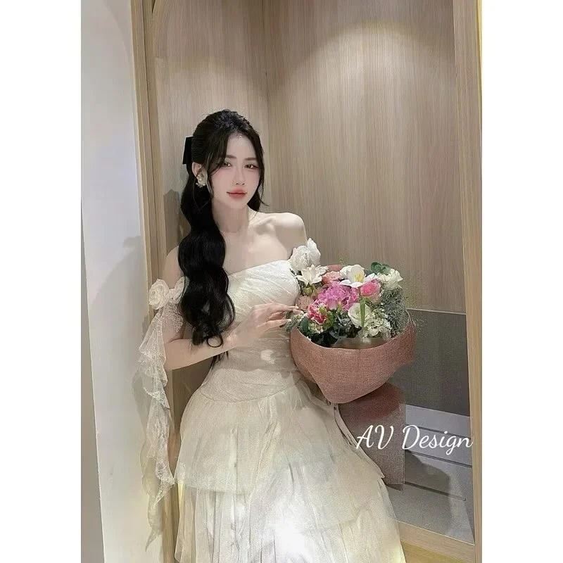 Photo 2 of Váy maxi tulle trễ vai màu kem