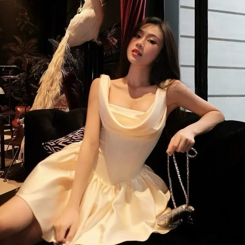 Photo 4 of Đầm ngắn vàng pastel vai trễ nữ