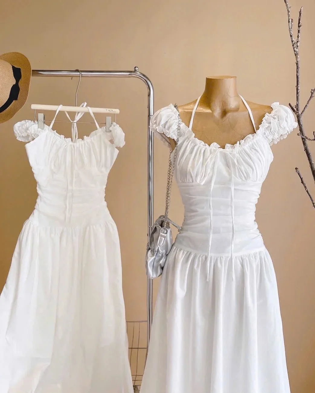Photo 6 of Váy maxi trắng trễ vai cột dây nữ