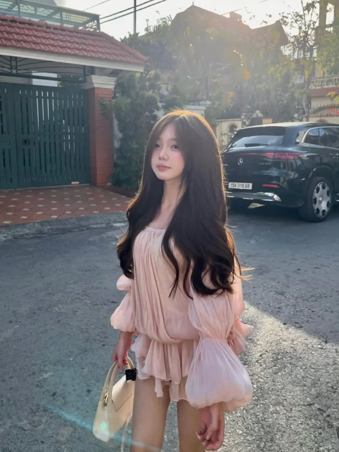 Ảnh 2 của Set váy hồng pastel trễ vai bèo nhún