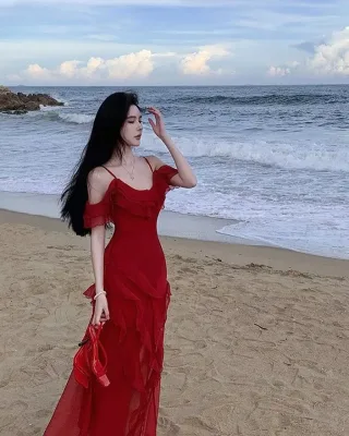 Photo 4 of Váy maxi đỏ trễ vai nữ tính