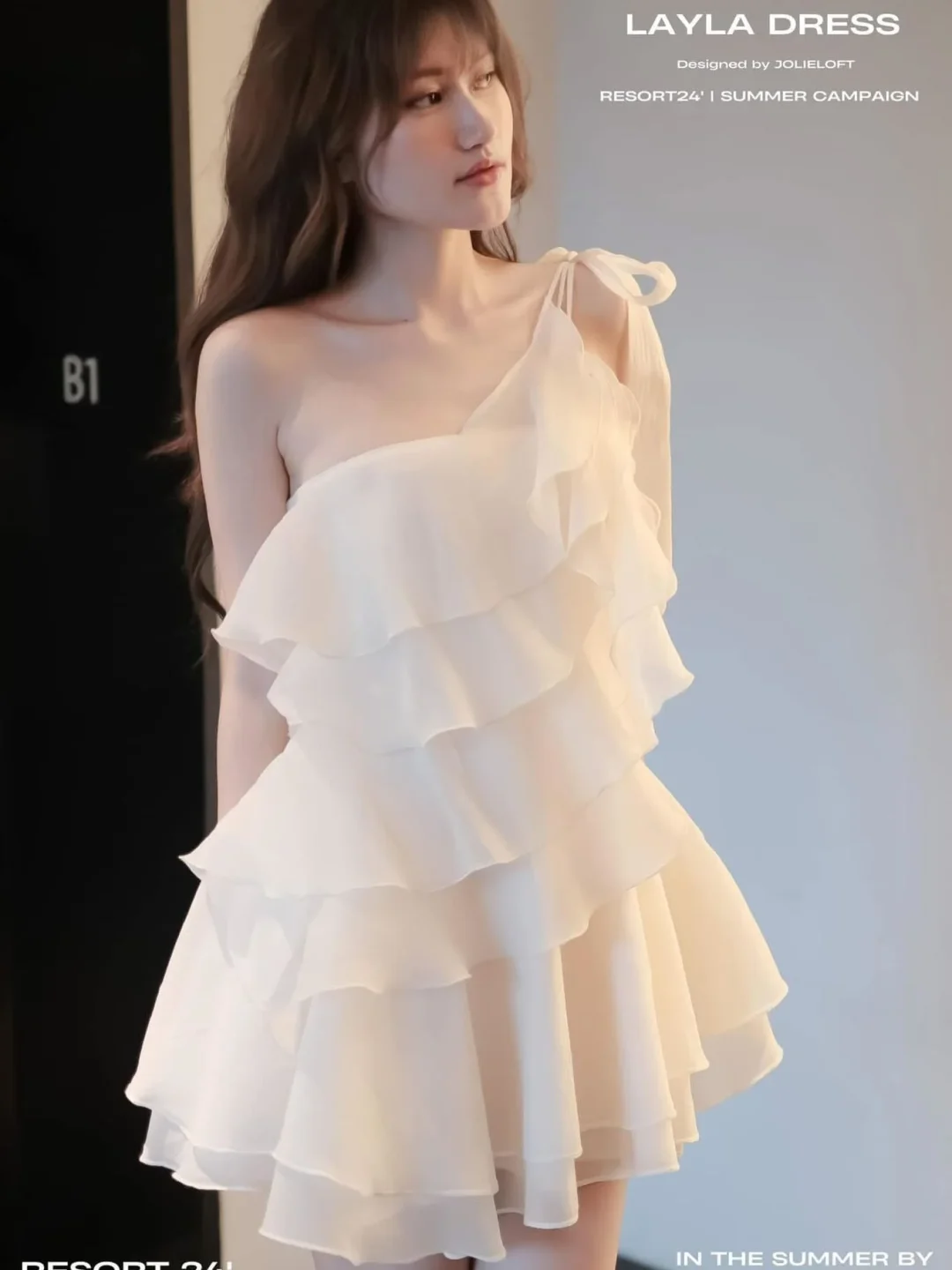 Ảnh 4 của Đầm mini trắng bèo nhún lệch vai