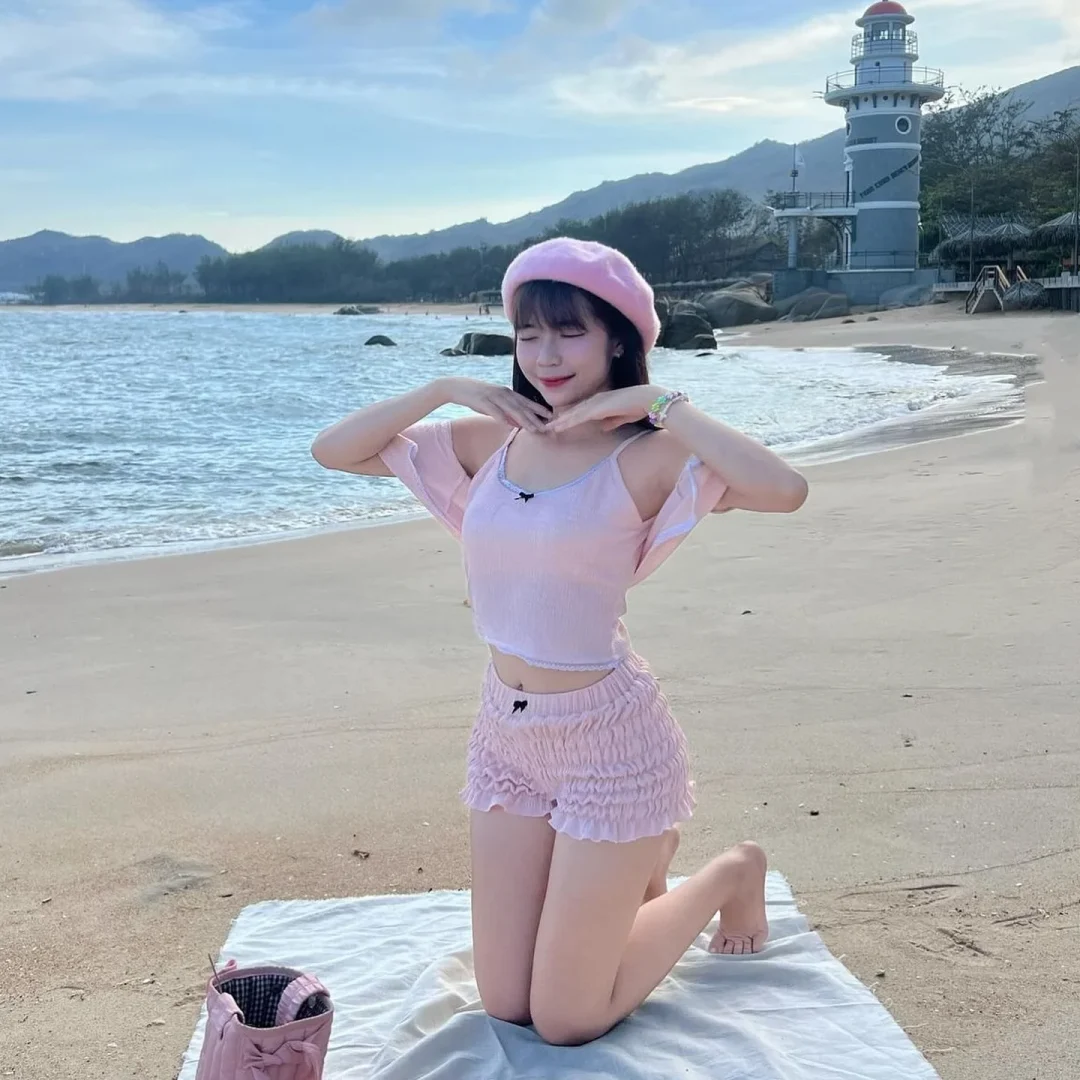 Photo 2 of Set cardigan len hồng pastel đi biển nữ