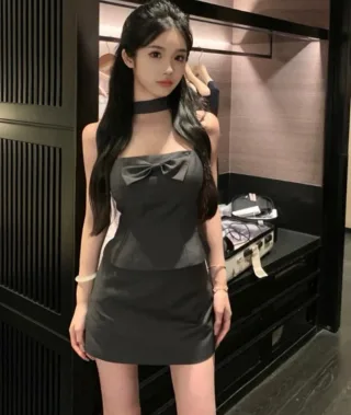Ảnh 1 của Váy mini đen nơ ngực Laris Set