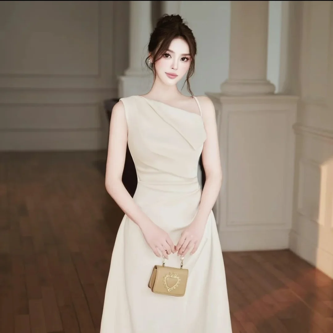 Ảnh 1 của Váy maxi một vai màu kem nữ