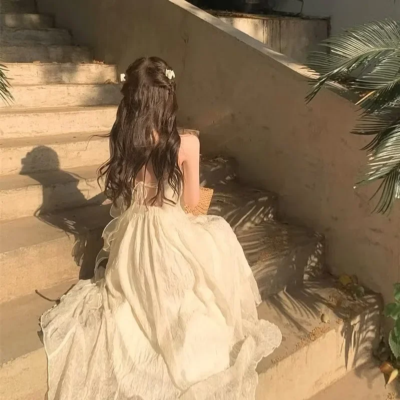 Photo 4 of Váy maxi trắng hai dây thêu ren nữ