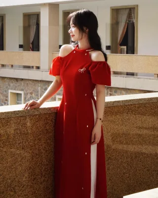 Photo 1 of Áo dài nhung đỏ vai trần nữ sang trọng