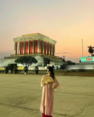 Photo 3 of Áo dài hồng pastel thêu hoa cho thuê