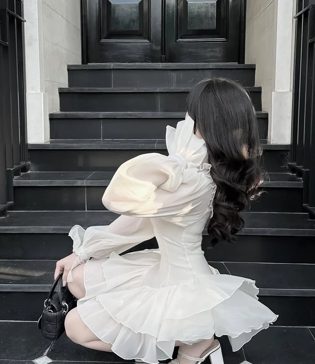 Photo 4 of Đầm voan kem bèo nhún tay phồng size M