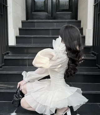 Photo 4 of Đầm voan kem bèo nhún tay phồng size M