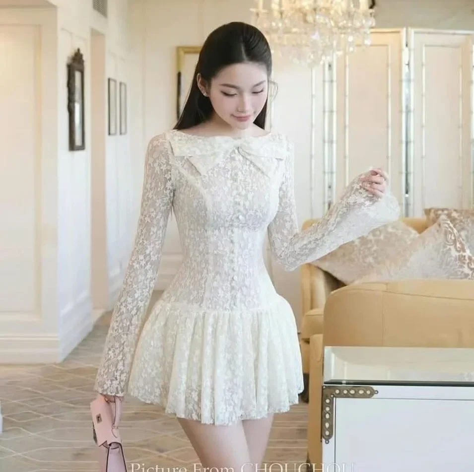 Photo 1 of Đầm ren trắng tay dài nữ tính