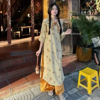 Photo 1 of Áo dài hoa nhí vàng nhạt nữ