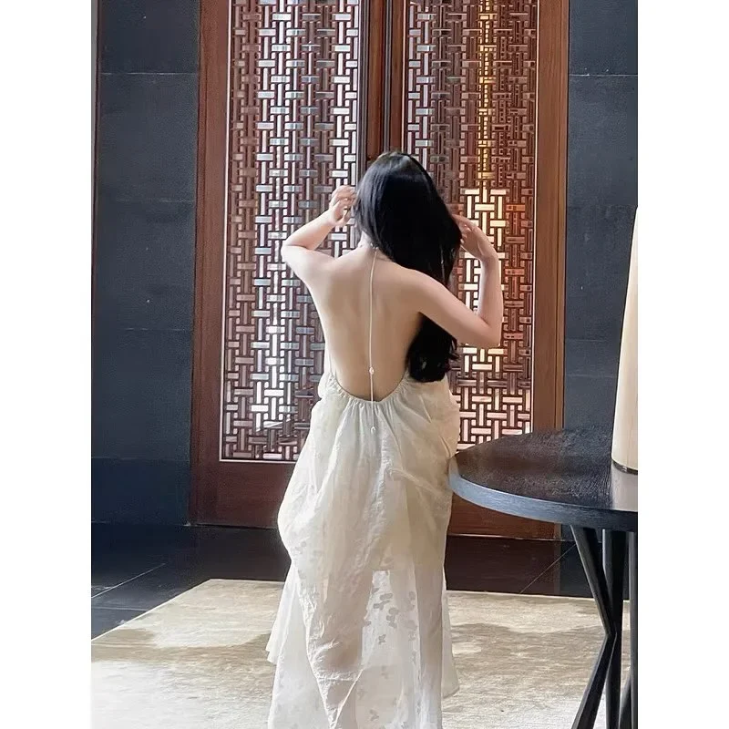 Ảnh 1 của Đầm maxi trắng hở lưng cho thuê