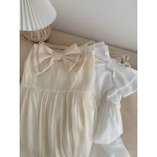 Photo 4 of Váy maxi trắng nơ ngực nữ tính