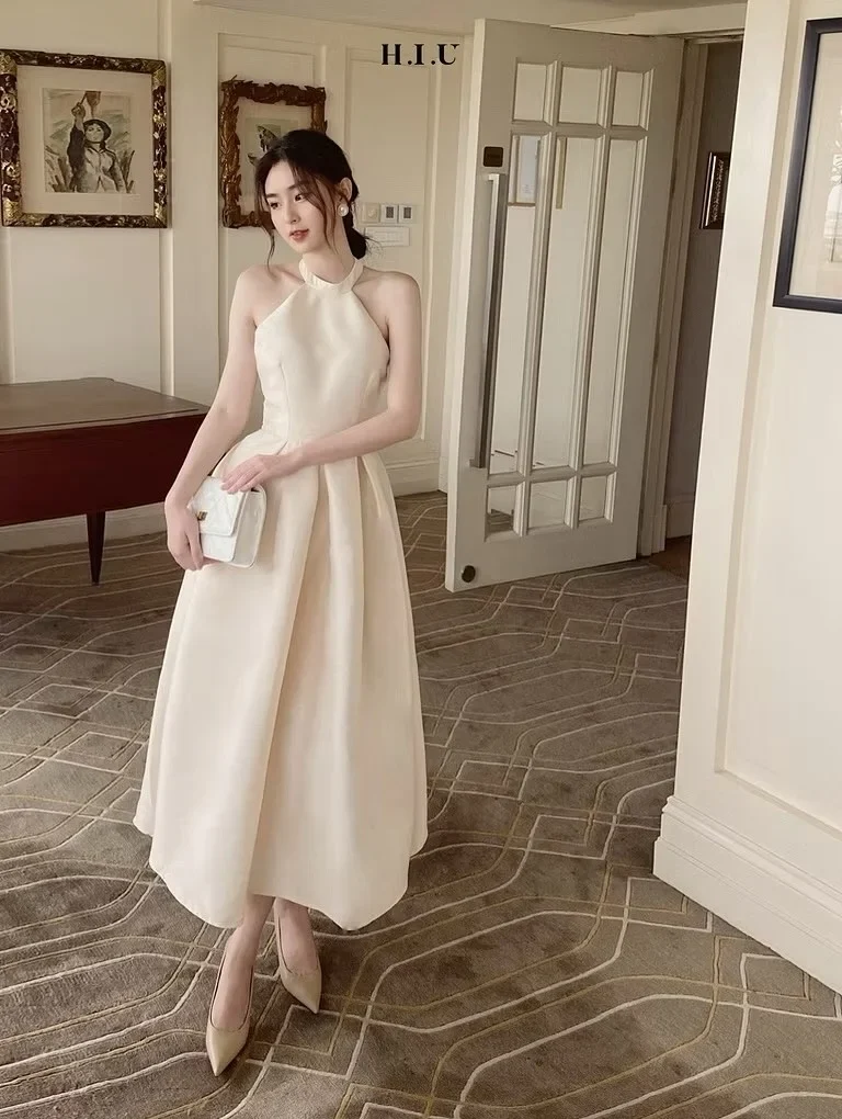 Photo 1 of Đầm midi halter lụa kem nữ