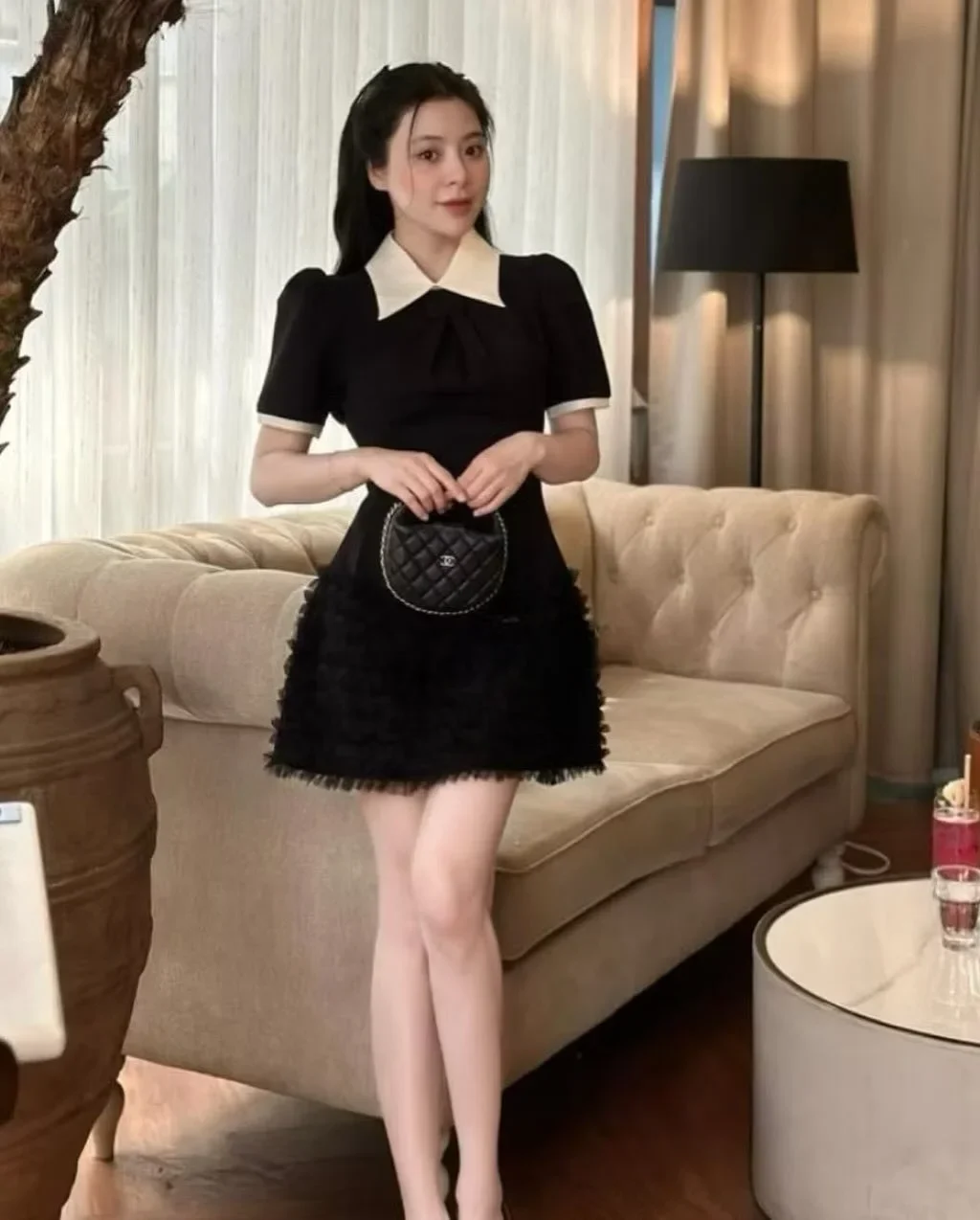 Ảnh 4 của Đầm đen cổ sen tay ngắn nữ