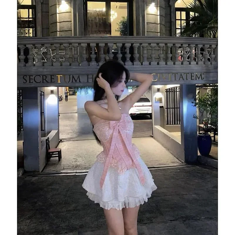 Ảnh 1 của Đầm ngắn hồng trắng nơ lớn nữ
