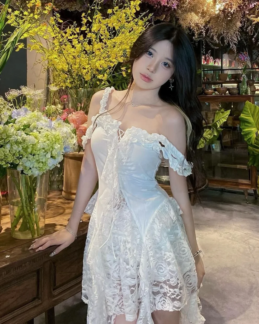 Photo 2 of Váy ren trắng ngắn babydoll nữ