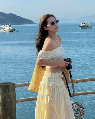 Ảnh 2 của Set croptop trễ vai váy maxi vàng boho nữ