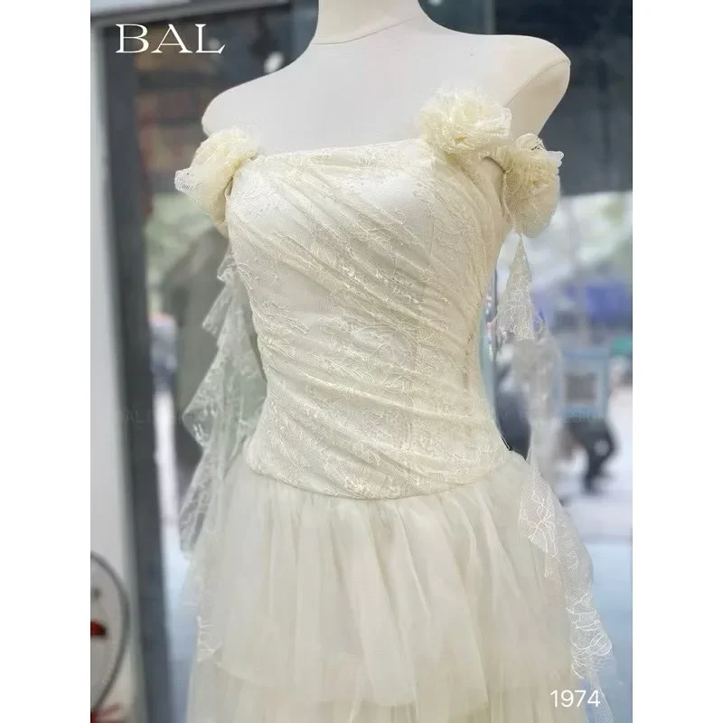 Photo 4 of Váy maxi tulle trễ vai màu kem