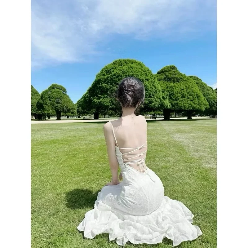Photo 1 of Váy maxi trắng cột dây lưng nữ