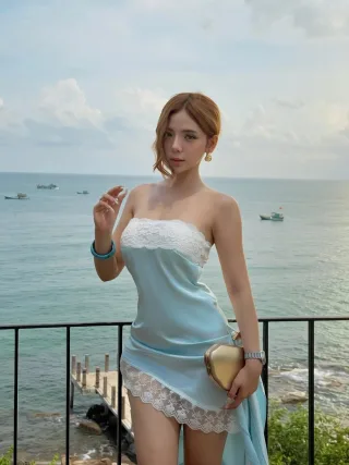 Ảnh 3 của Váy maxi lụa xanh hở lưng nữ