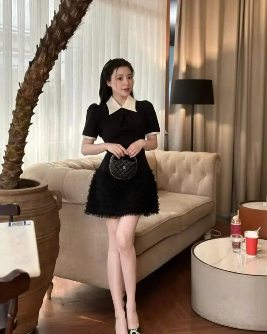 Photo 3 of Đầm đen cổ trắng bèo nhún nữ