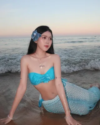 Photo 4 of Bộ bikini đan móc xanh nhạt nữ