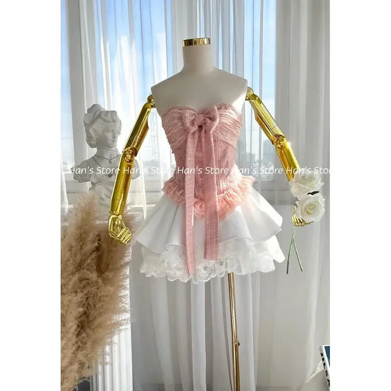Ảnh 2 của Đầm ngắn hồng trắng nơ lớn nữ