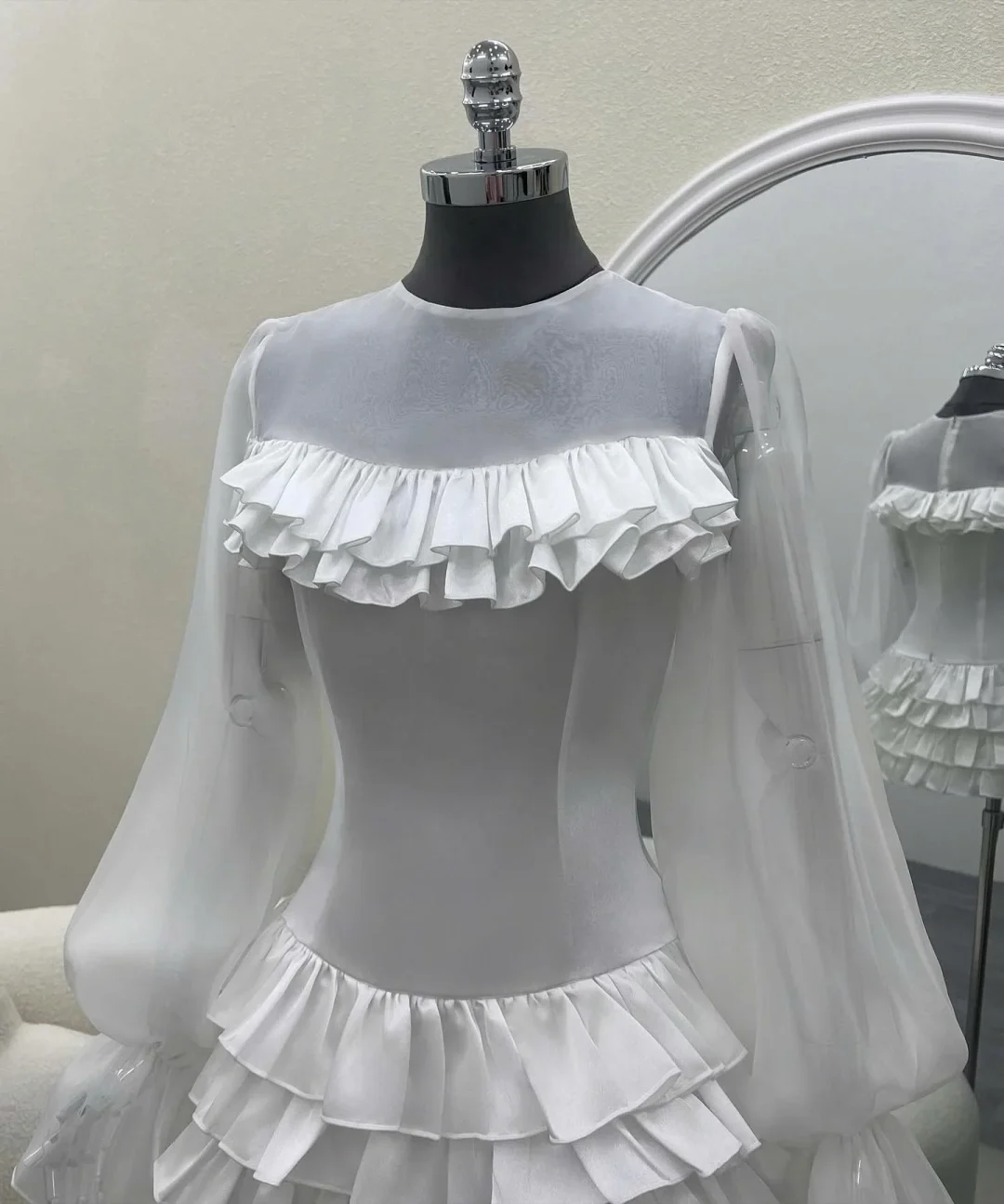 Ảnh 9 của Đầm trắng bèo nhún tay dài nữ tính