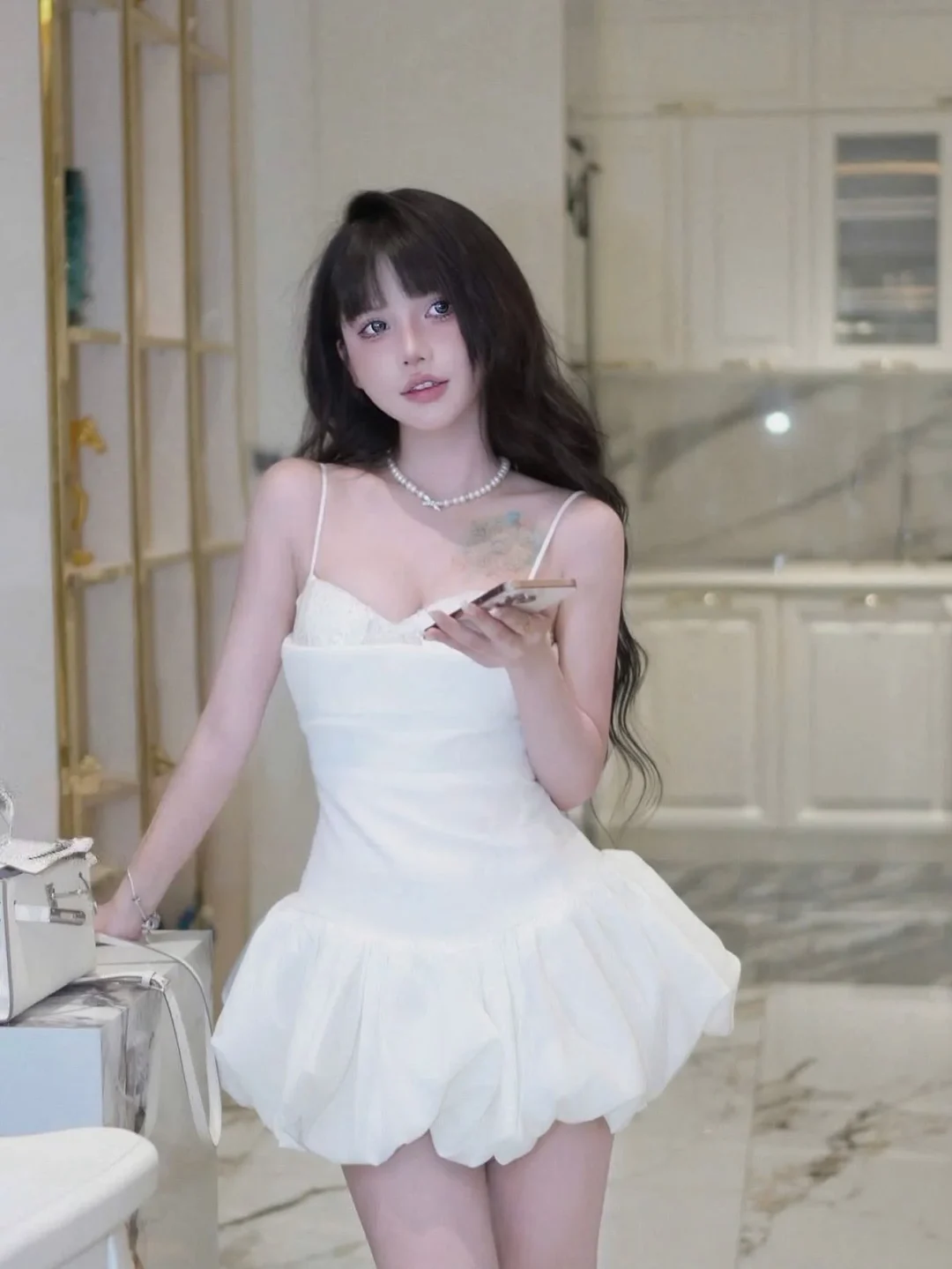 Photo 2 of Đầm trắng ngắn hai dây babydoll nữ