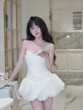Photo 2 of Đầm trắng ngắn hai dây babydoll nữ