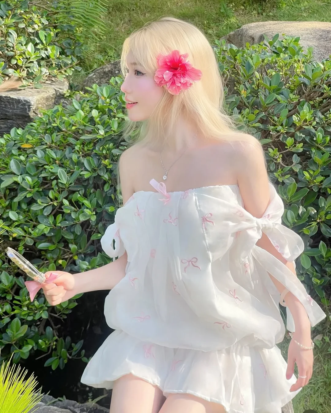 Photo 5 of Váy babydoll trắng nơ hồng nữ