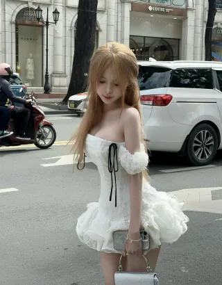 Photo 3 of Váy trắng ngắn bèo nhún ren nữ