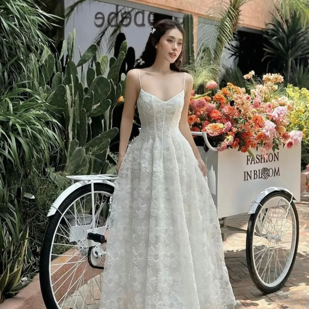 Photo 1 of Đầm ren trắng Muse hai dây dài