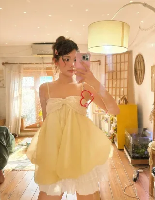 Photo 3 of Đầm babydoll voan vàng nhạt nữ tính