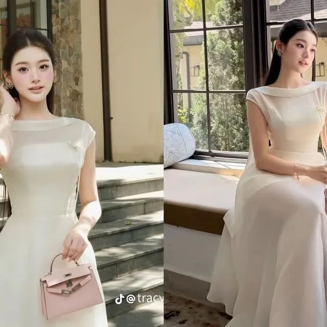 Ảnh 1 của Áo dài Zamy lụa kem nữ size L