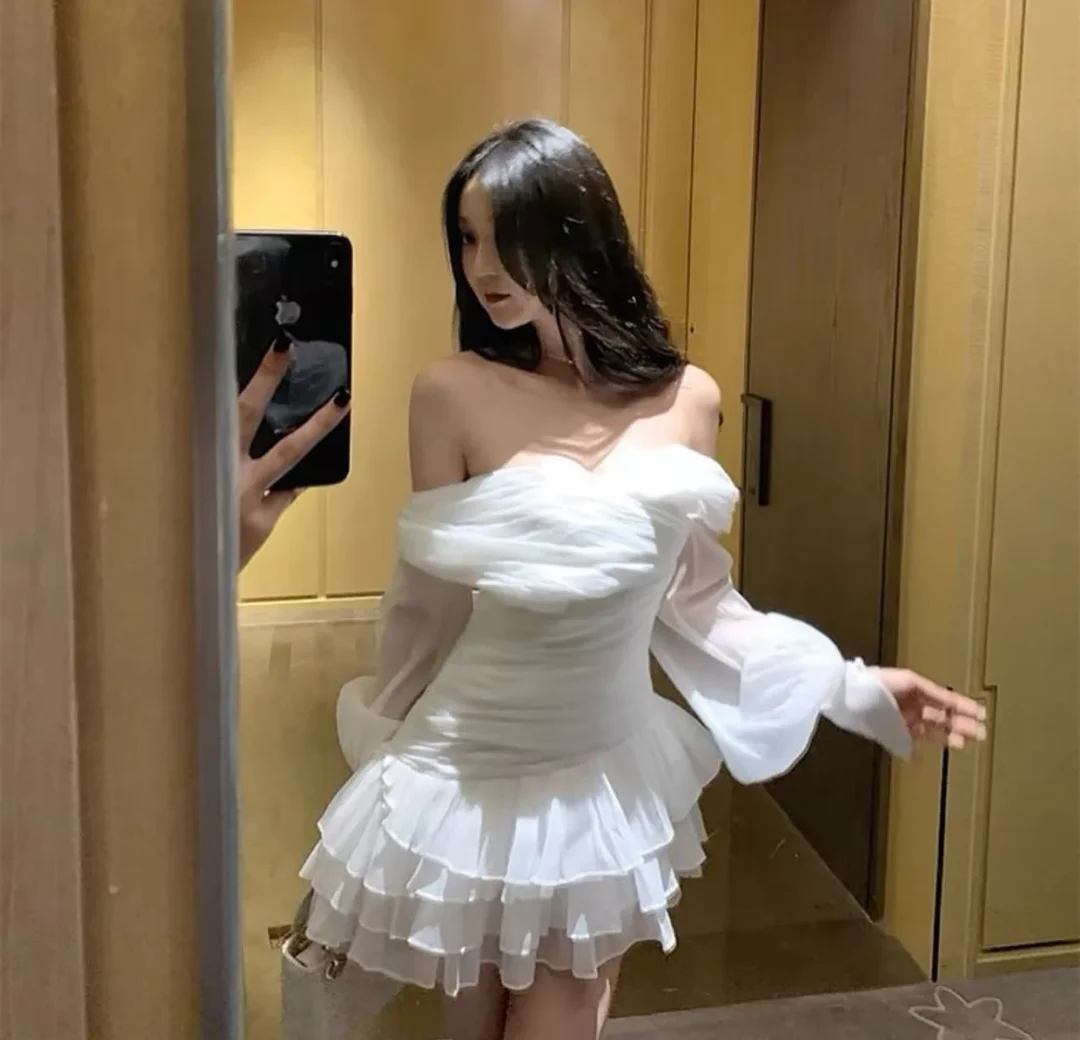 Photo 2 of Váy trắng trễ vai tay voan size S