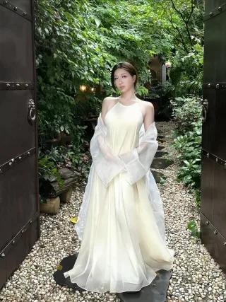 Photo 1 of Váy maxi voan cổ yếm vàng nhạt nữ