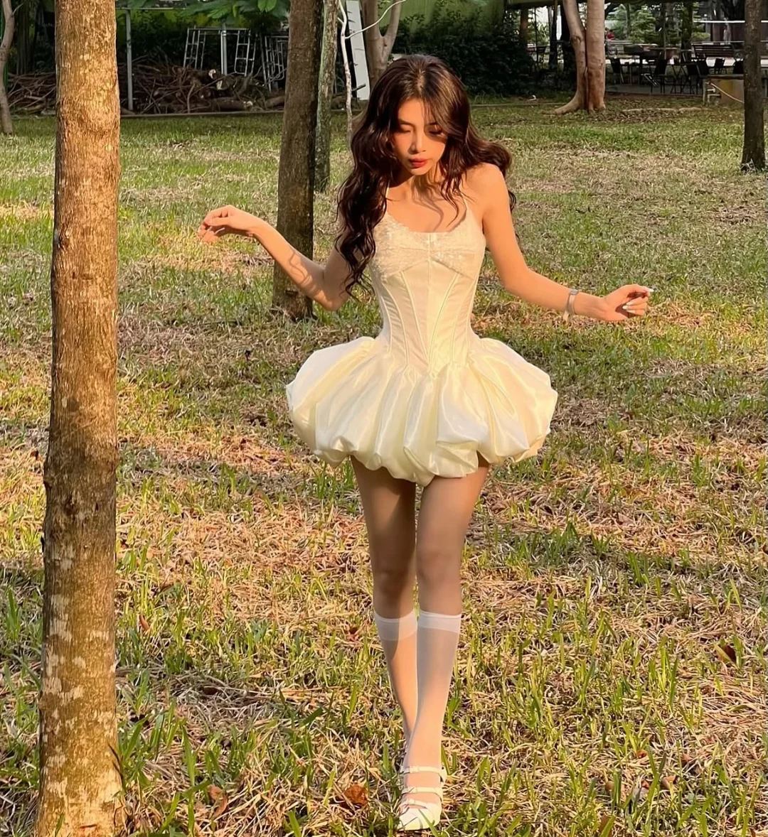 Photo 3 of Váy tiệc corset mini lụa kem nữ