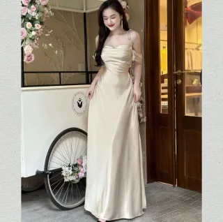 Photo 1 of Đầm maxi satin kem trễ vai nữ