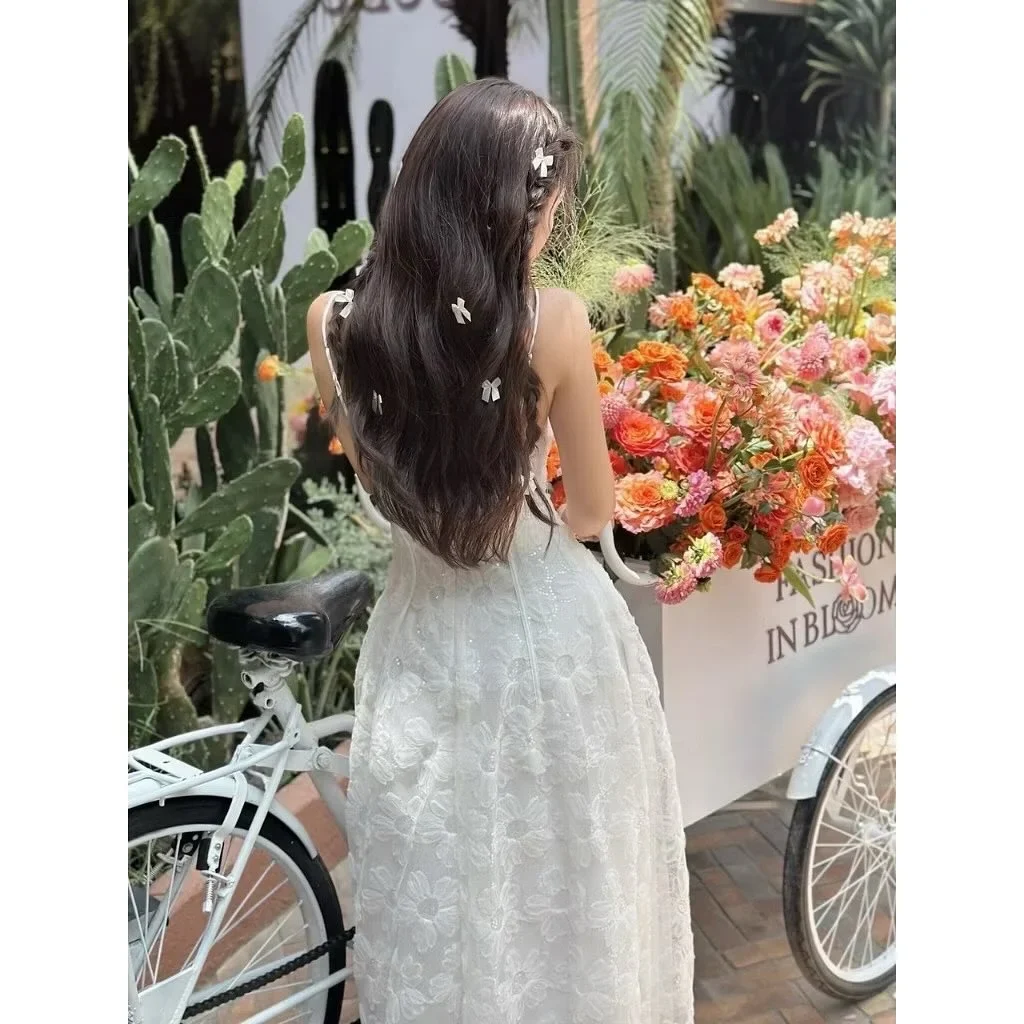 Photo 3 of Váy maxi trắng thêu hoa nữ