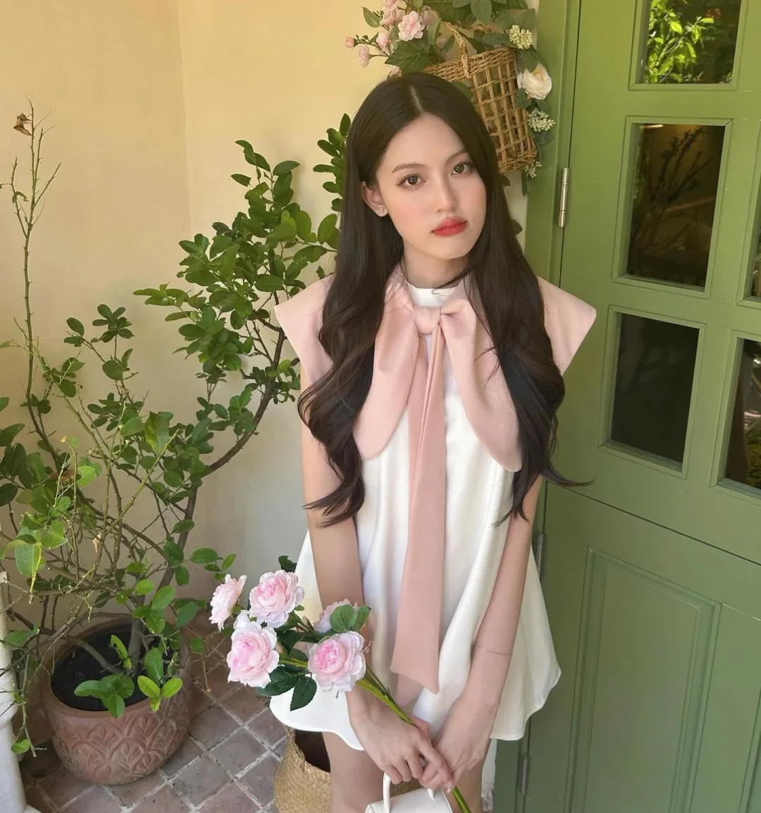Photo 1 of Đầm trắng nơ hồng Nana Aguja size S M L