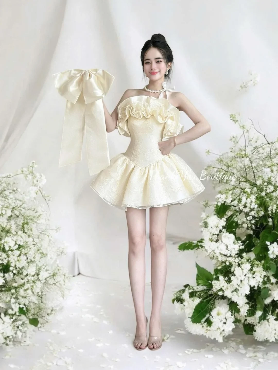 Ảnh 1 của Đầm ngắn ruffle vai nơ vàng nhạt nữ tính