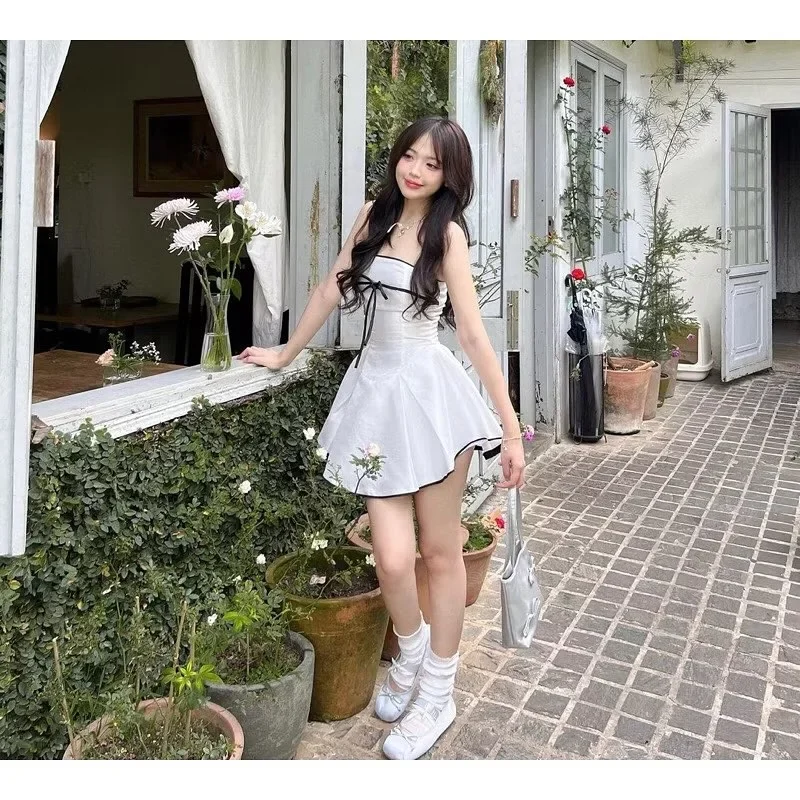 Ảnh 4 của Đầm trắng ngắn cột nơ đen nữ tính