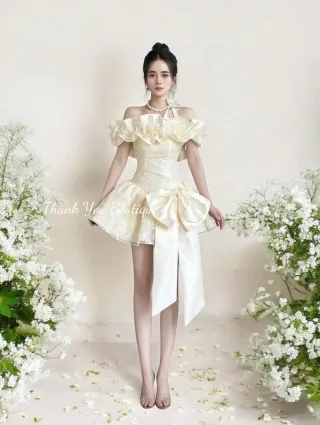 Ảnh 4 của Đầm ngắn ruffle vai nơ vàng nhạt nữ tính