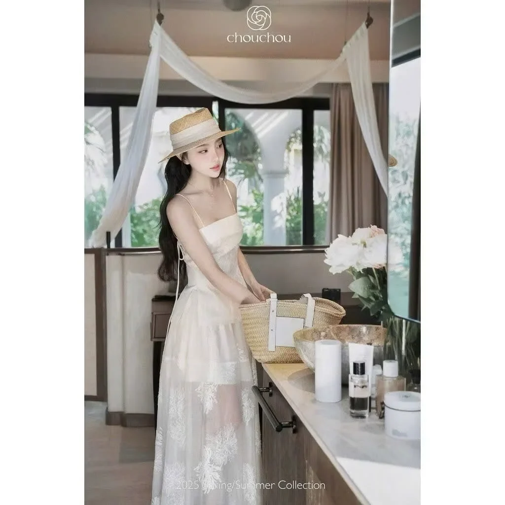 Photo 2 of Váy maxi trắng thêu hoa nữ cho thuê
