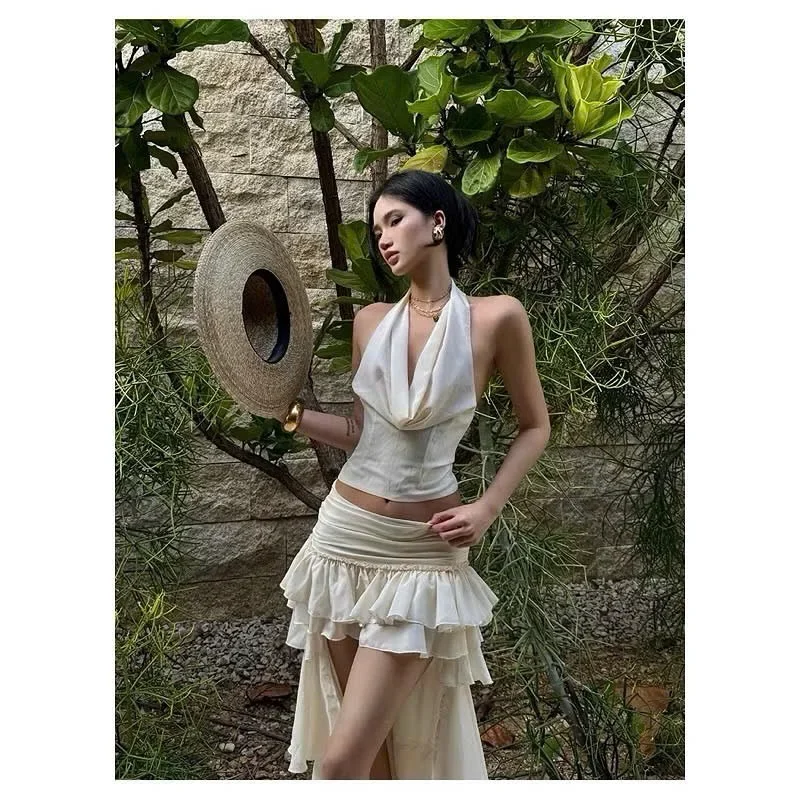 Ảnh 4 của Đầm maxi trắng lụa halter xẻ tà